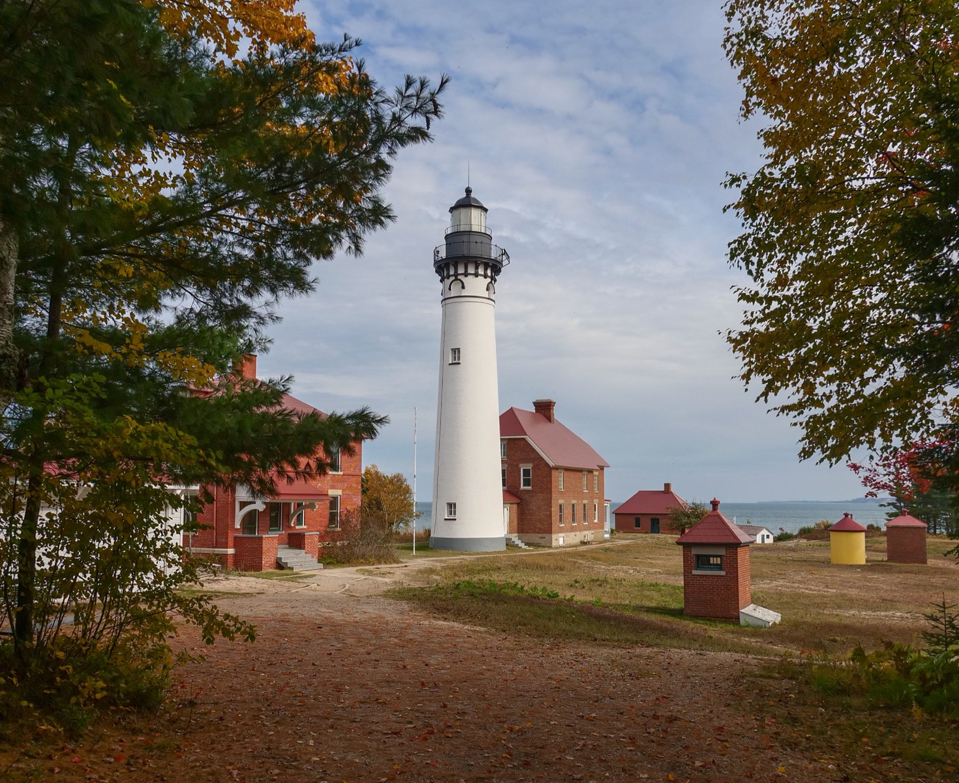 Au Sable Light Station, white tower and red brick keeper's house